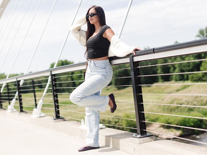 Woman wearing Purple Ballerines