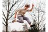 Man jumping in Black Camino Sandals
