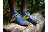 Blue and yellow barefoot running shoes