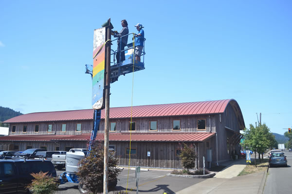 Removing old Softstar rainbow sign