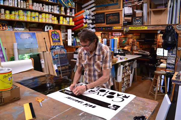 Brad Johnson in his sign workshop