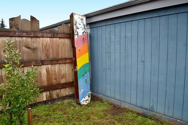Old rainbow Sign is now a bird house