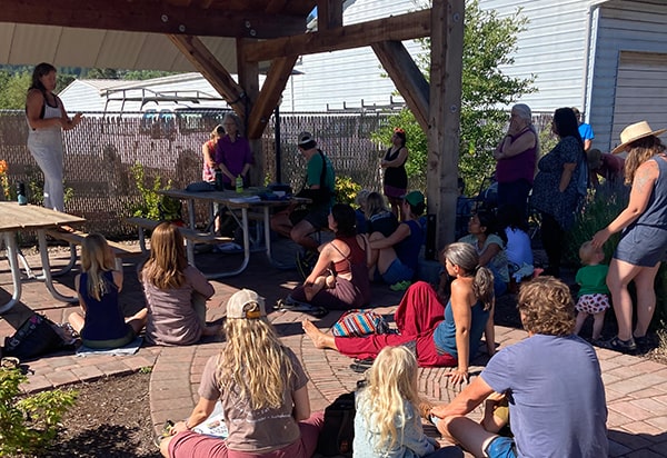 Katy talking with visitors at Grow Wild Day